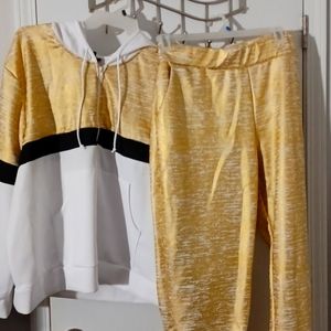 Ashley Stewart's jogging set, gold, black and white. Jacket size 30 and pants 2X